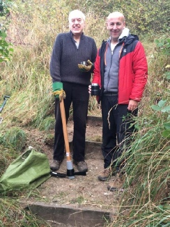 Dave Coupe and Alan Mason clear the steps.